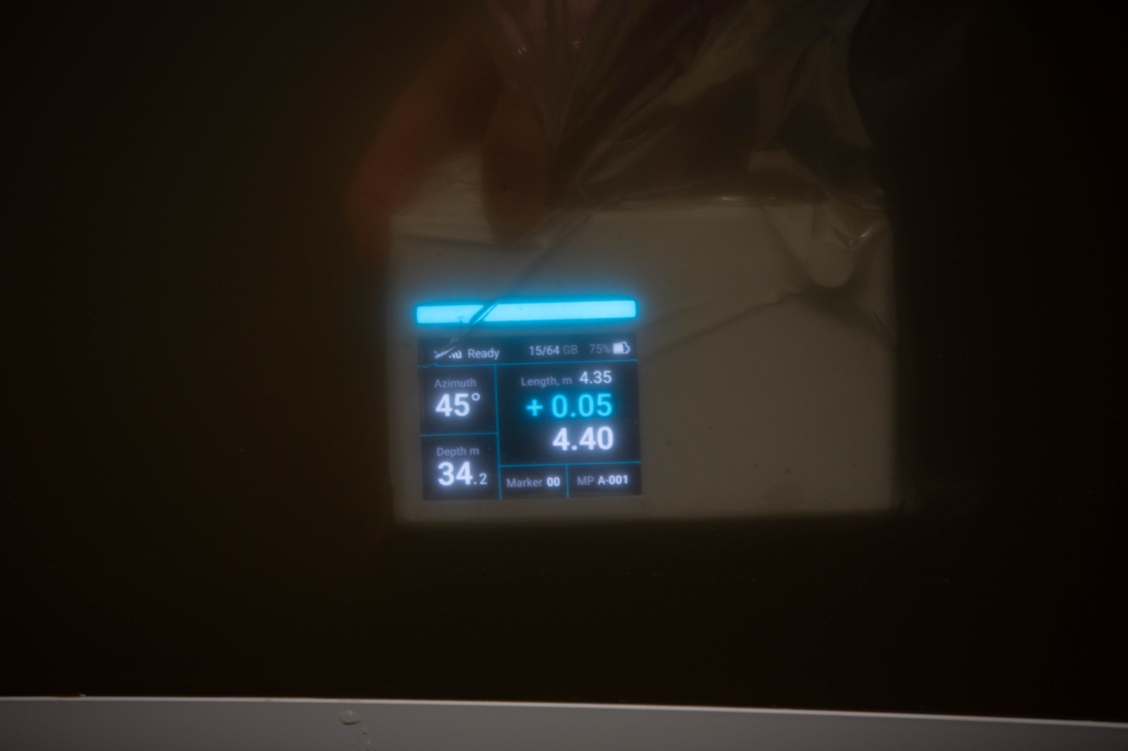Checking the screen readability under dirty water.